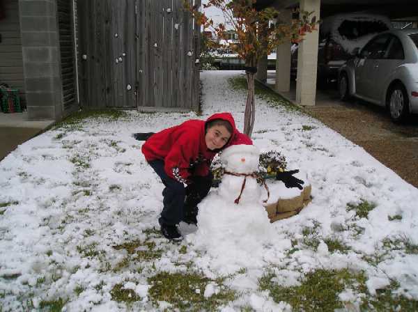 Zck Granthams , who is from Florida was visting his grandparents, was able to build his first snowman.