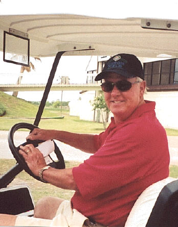 Jim Murphey drives the drink cart.